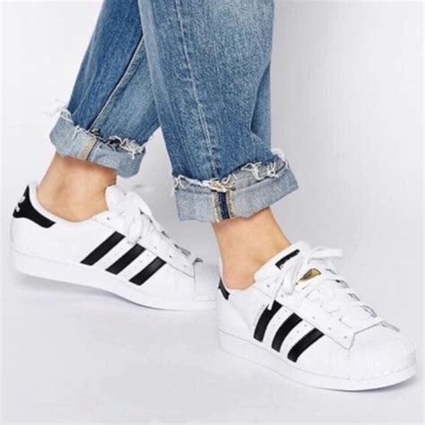 white adidas shoes black stripes